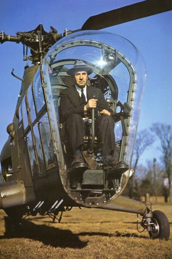 1945. AA. Igor Sikorsky in the cockpit of a Sikorsky S-48 (R-5) helicopter.
