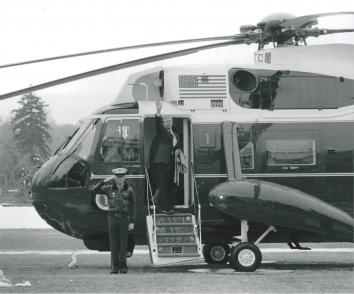 1981, January 16. AA. Washington, District of Columbia. President Jimmy Carter waves goodbye as he departs the White House for Camp David, Maryland aboard the Marine One Sikorsky VH-3D helicopter. This is four days before the end of President Carter's term as the U.S. President. Photo by Warren K. Leffler